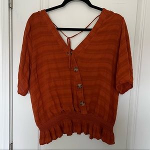 Terracotta top with tortoise shell buttons